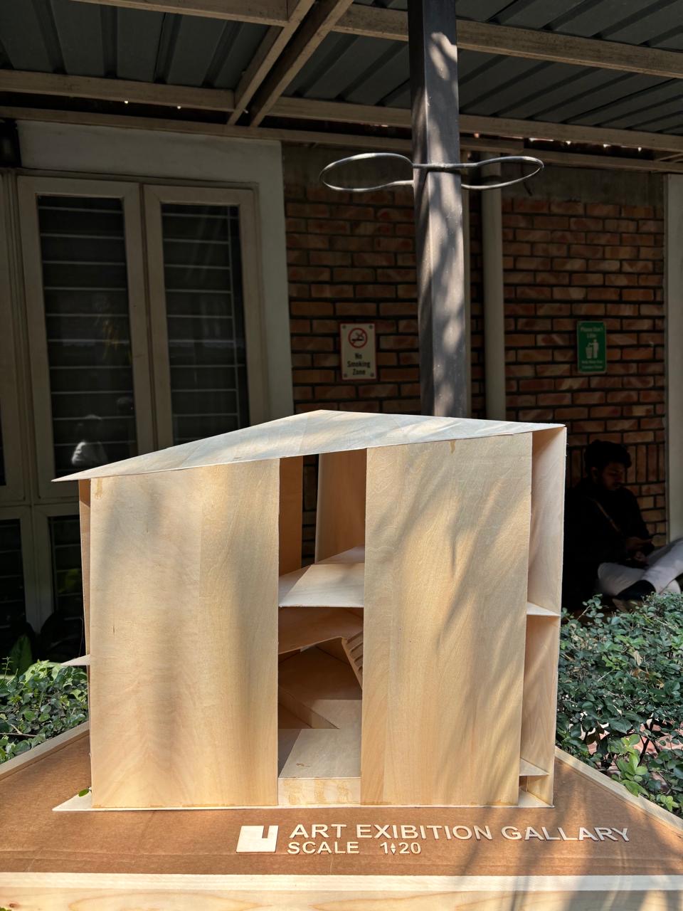 Front elevation — the fins read as a single facade.